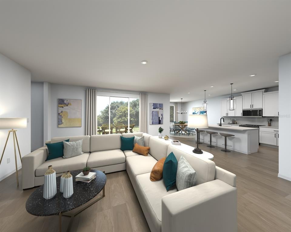 This is a digital rendering of an open-concept living room and kitchen with light flooring — 14176 HARVEST PINES LANE, HUDSON, FL