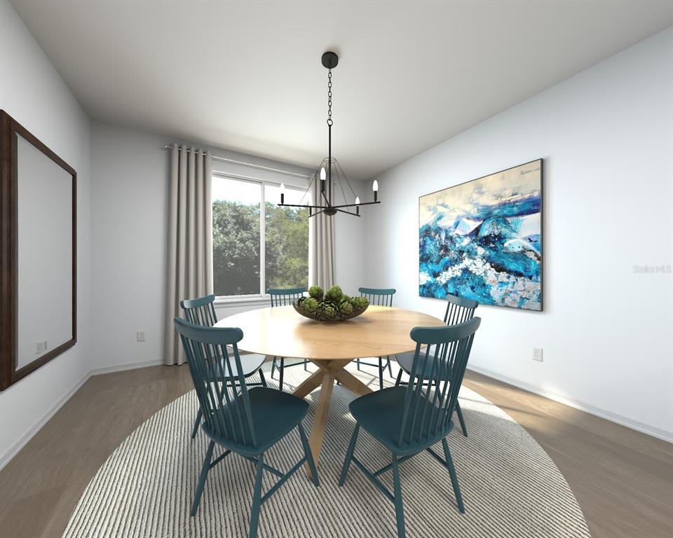 This is a digital rendering of a dining room featuring a round table and blue chairs — 14176 HARVEST PINES LANE, HUDSON, FL