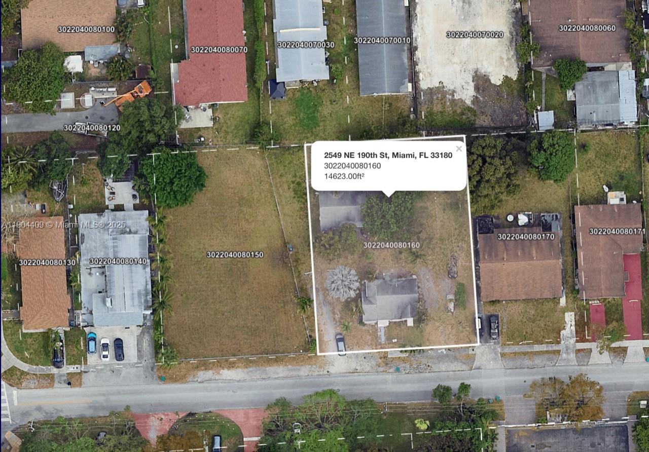An aerial map view shows a residential property lot outlined in white among neighboring parcels — 2549 NE 190th St, Miami FL 33180, MIAMI, FL