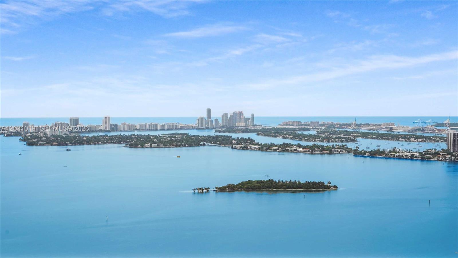 An aerial view shows a bay with islands and a distant city skyline — 2900 NE 7th Ave # 4102, Miami FL 33137, MIAMI, FL