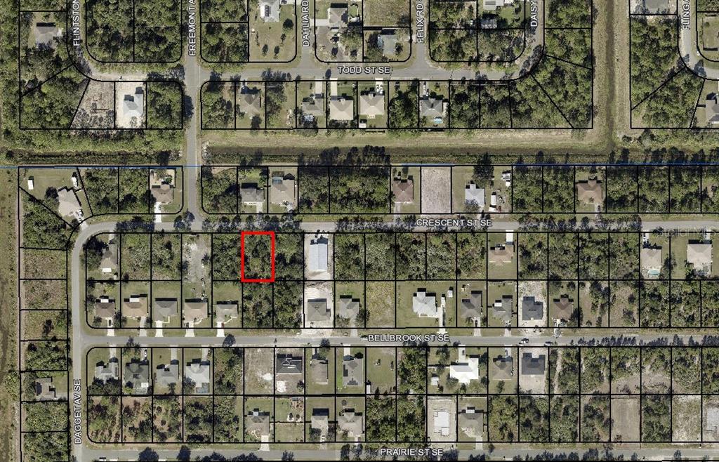 This is an aerial map showing a vacant lot highlighted in red within a residential neighborhood — 160 CRESCENT STREET SE, PALM BAY, FL