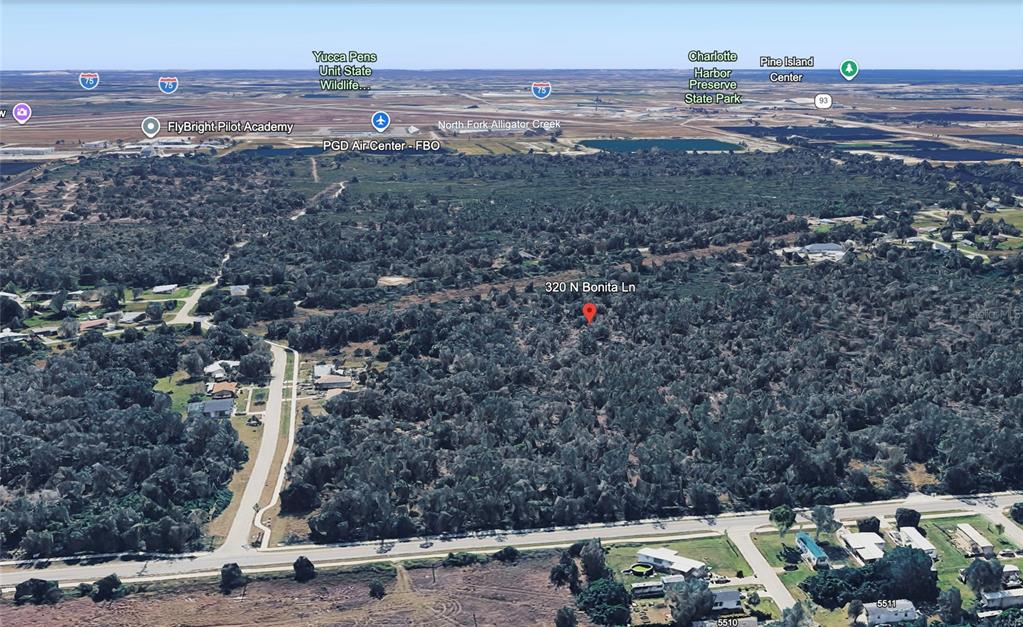 This is an aerial map view of a wooded residential lot — 320 N BONITA LANE, PUNTA GORDA, FL