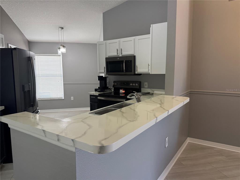 16212 COOPERS HAWK AVENUE, CLERMONT, FL — photo 4 of 15