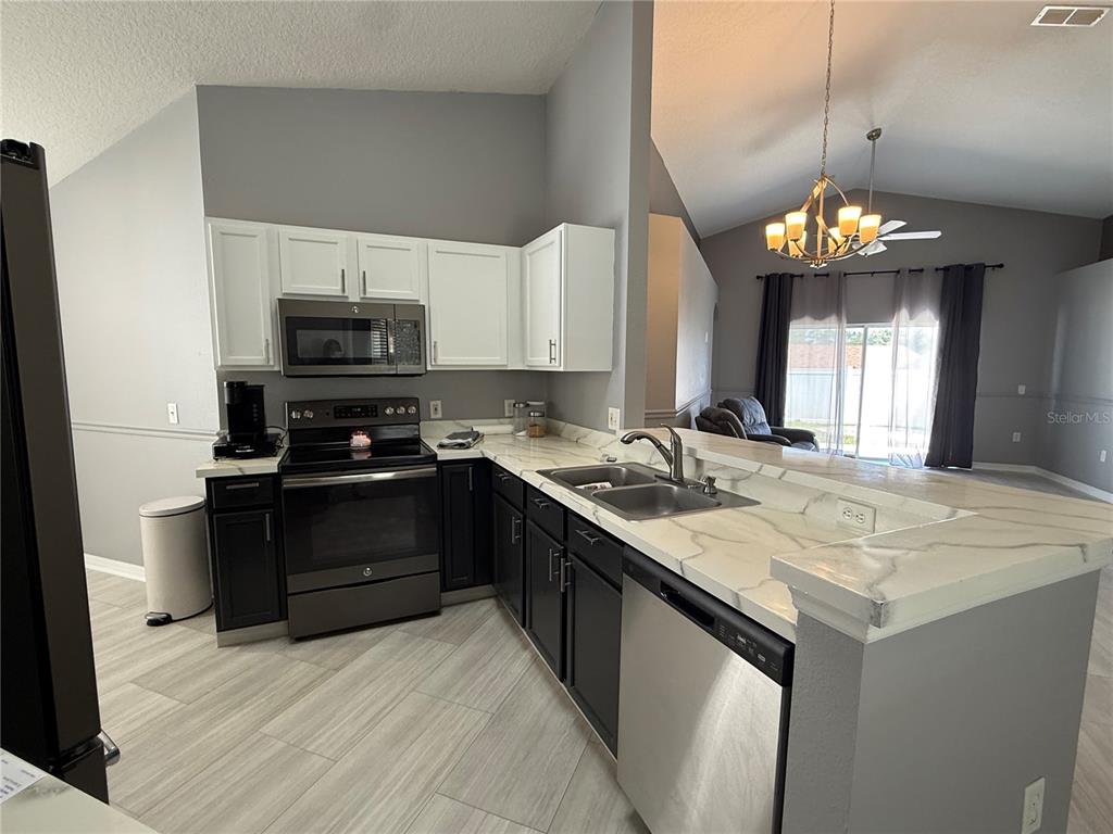 16212 COOPERS HAWK AVENUE, CLERMONT, FL — photo 5 of 15