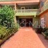 A paved walkway leads to the entrance of a two-story building with a balcony — 12 Carr 993 DESTINO, VIEQUES, PR