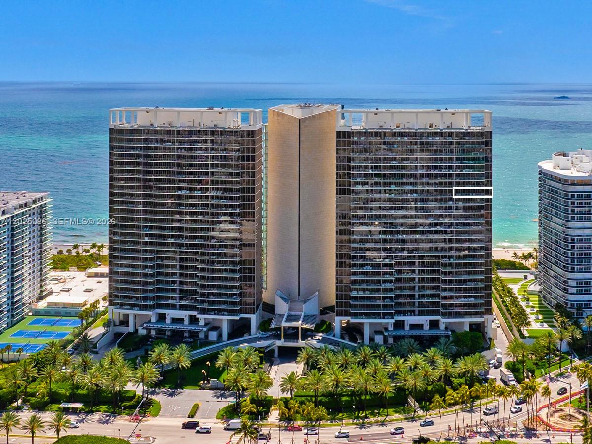 An aerial view of a large residential building complex situated along a sandy beach — 9701 Collins Ave # 2001S, Bal Harbour FL 33154, BAL HARBOUR, FL