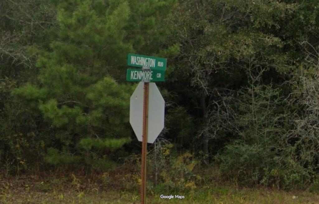 A street sign at the intersection of Washington Boulevard and Kenmore Circle stands outdoors — Lot 11, Unit 6, Blk 364, KENMORE CIRCLE, CHIPLEY, FL