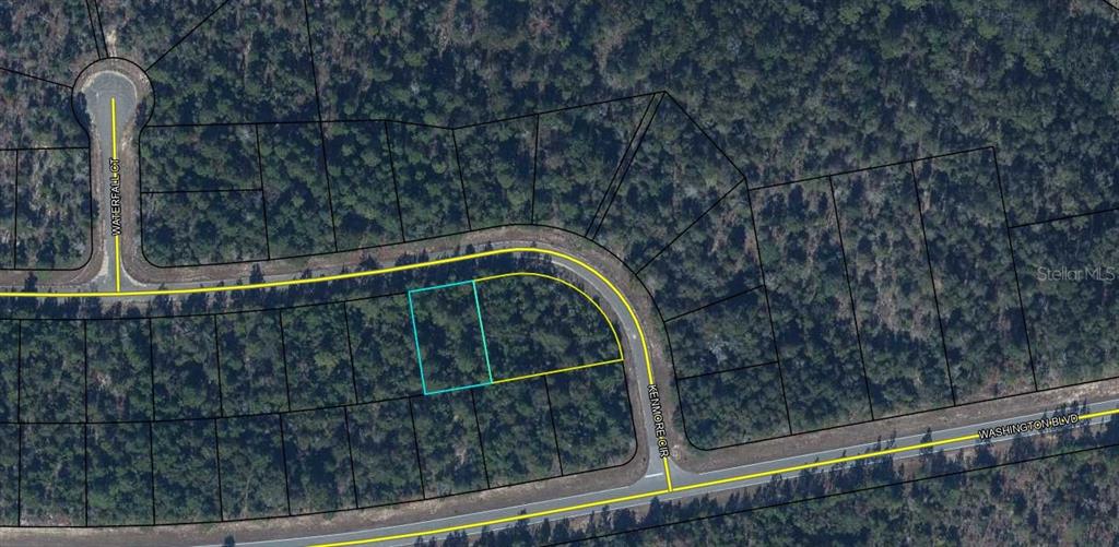 This is an aerial map showing a vacant residential lot outlined in blue — Lot 11, Unit 6, Blk 364, KENMORE CIRCLE, CHIPLEY, FL