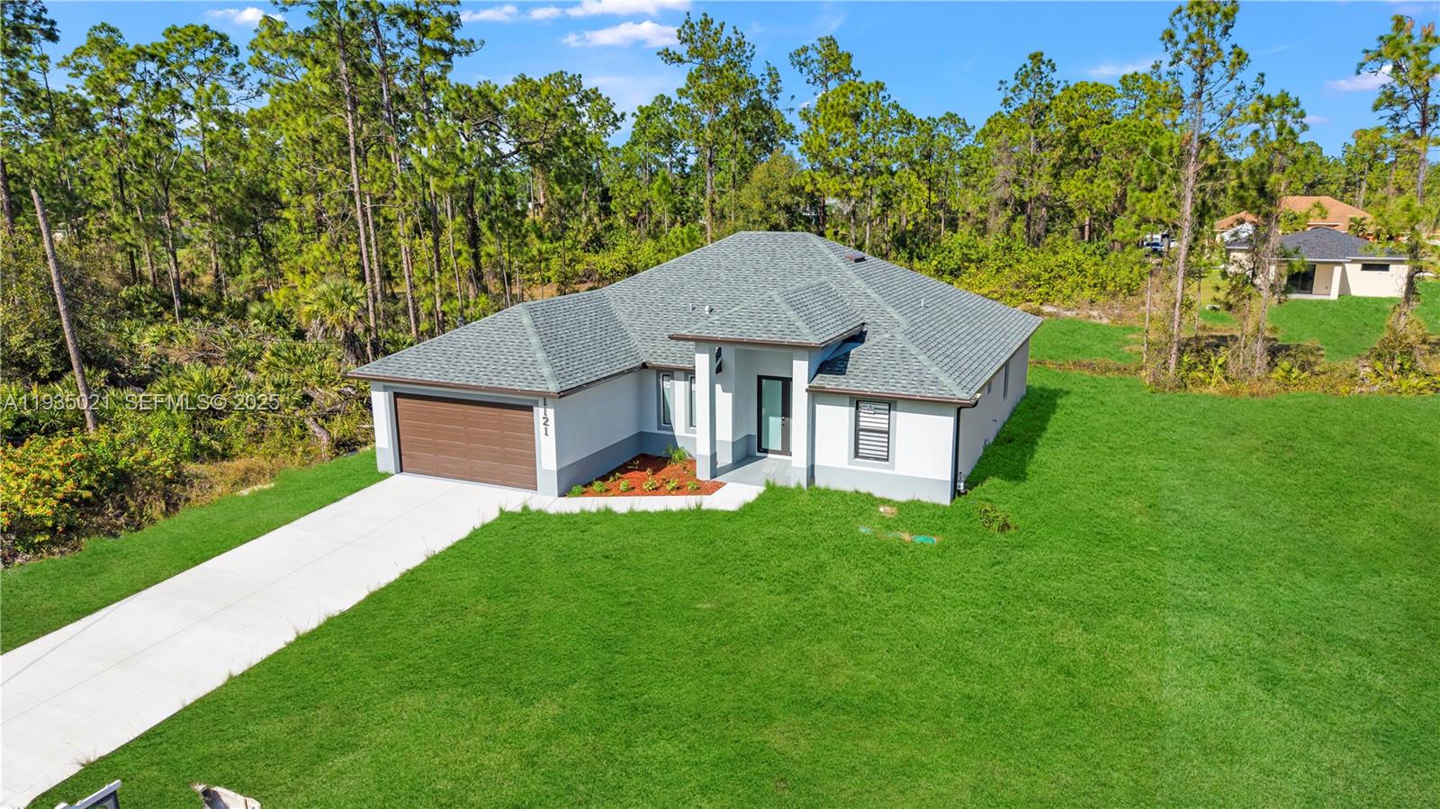1121 CROCUS ST E, Lehigh Acres FL 33974