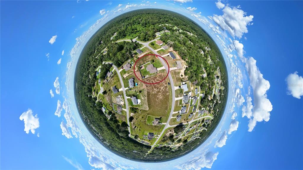 This is a 360-degree aerial view of a residential neighborhood featuring a highlighted single-family home — 263 EMERALD ROAD, OCALA, FL