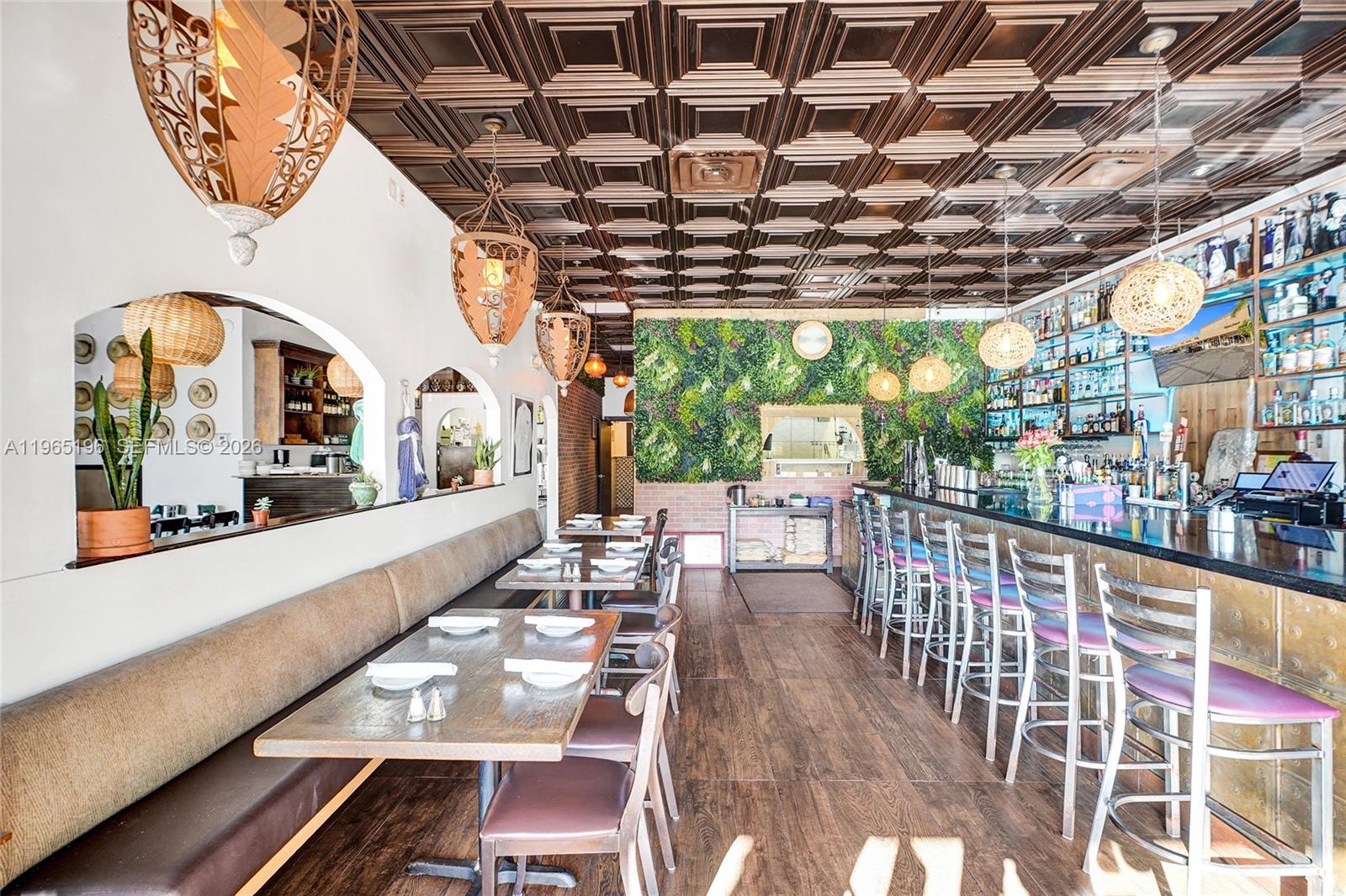 A restaurant interior features a bar, booth seating, hanging pendant lights, and a coffered ceiling — 15400 Biscayne Blvd, North Miami FL 33160, NORTH MIAMI, FL