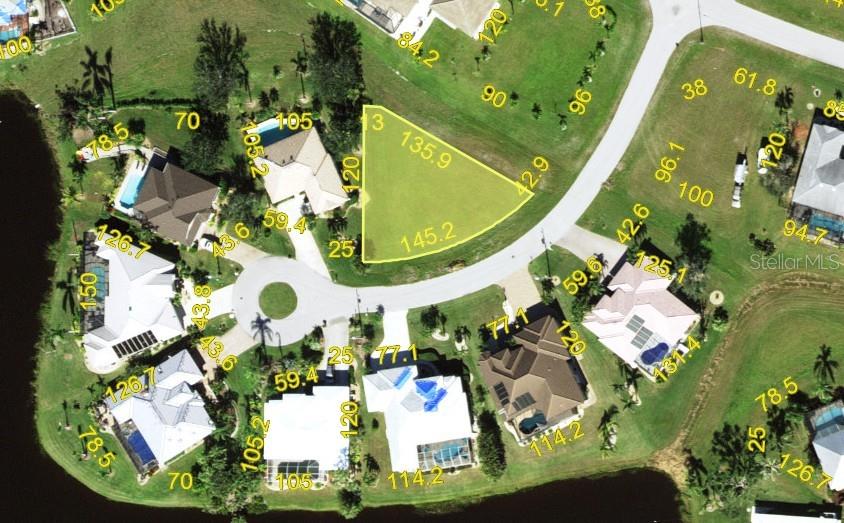 This is an aerial map showing a residential cul-de-sac with several houses and a vacant lot — 17473 HUANCAY LANE, PUNTA GORDA, FL