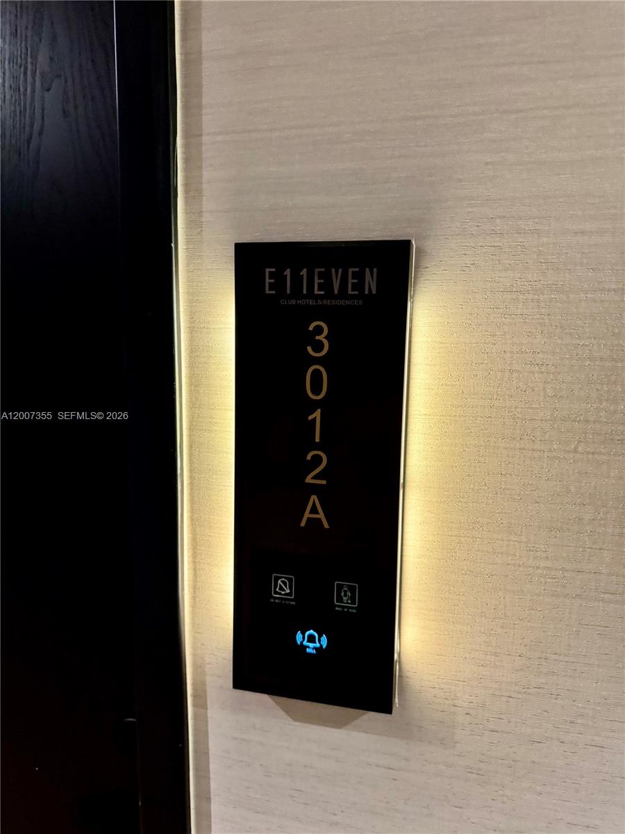 A vertical room number sign for unit 3012A is mounted on a textured wall — 20 NE 11th St # 3012A, Miami FL 33132, MIAMI, FL