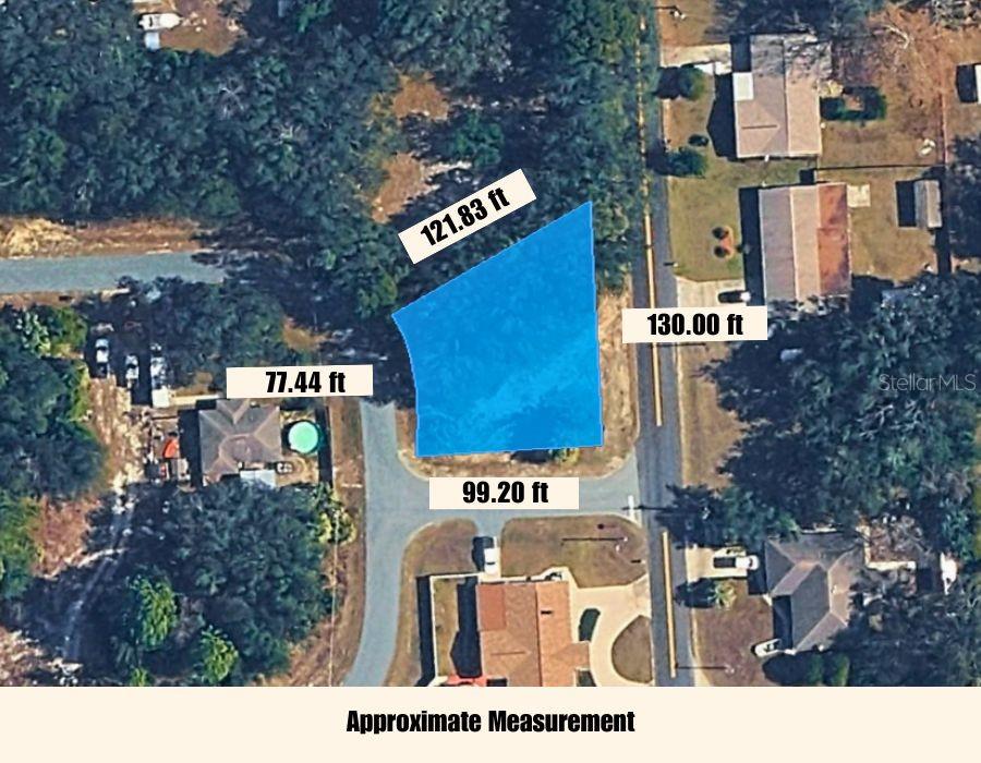 An aerial map view shows a highlighted vacant lot with its four boundary measurements — 8549 N BUSCETTA LOOP, CRYSTAL RIVER, FL