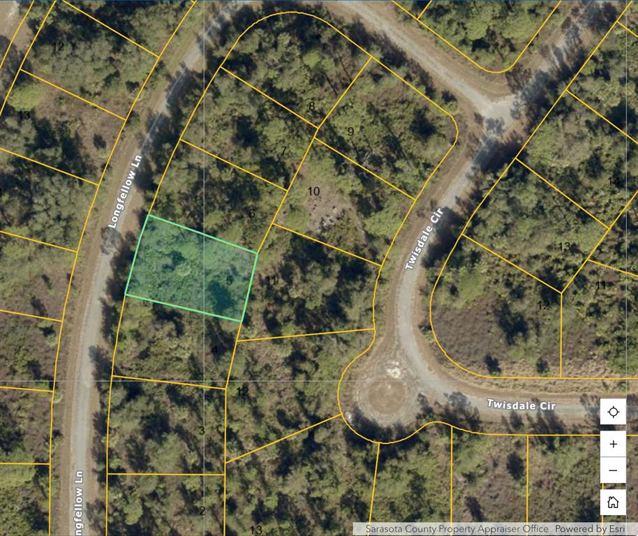 This is a satellite map showing a highlighted rectangular land parcel between two residential streets — LONGFELLOW LANE, NORTH PORT, FL