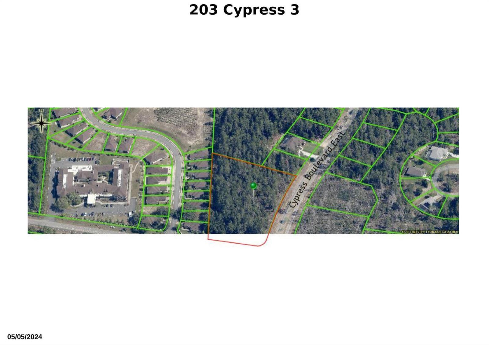 This is an aerial map showing a wooded lot outlined in red and green — 203 Cypress Boulevard E, FL 34446, FL