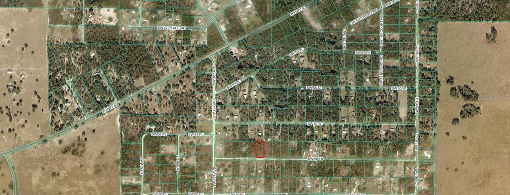 This is an aerial map showing a highlighted rectangular land parcel within a residential neighborhood — 00 SW 58TH LANE, OCALA, FL