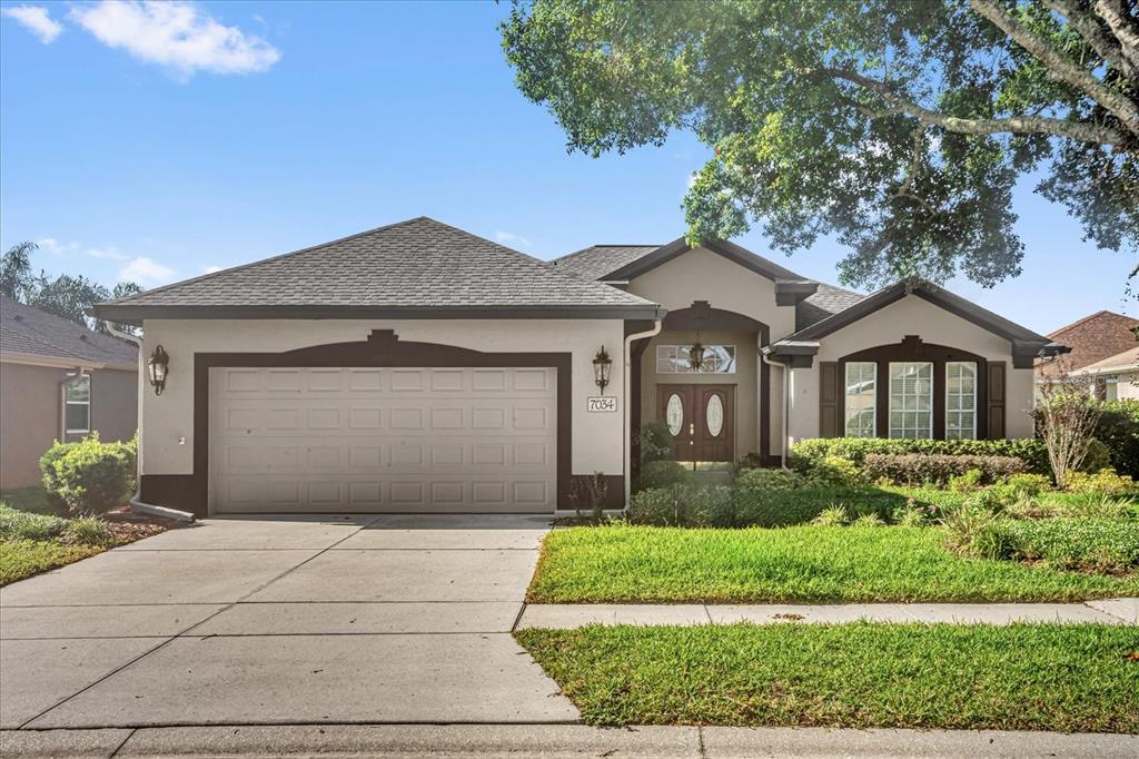 7034 PINE HOLLOW DRIVE