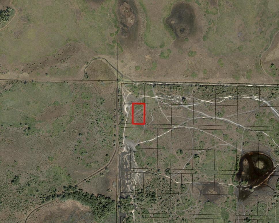 An aerial map view shows a rectangular plot of land highlighted in red — 0 NW 318th Street, Okeechobee FL 34972, OKEECHOBEE, FL