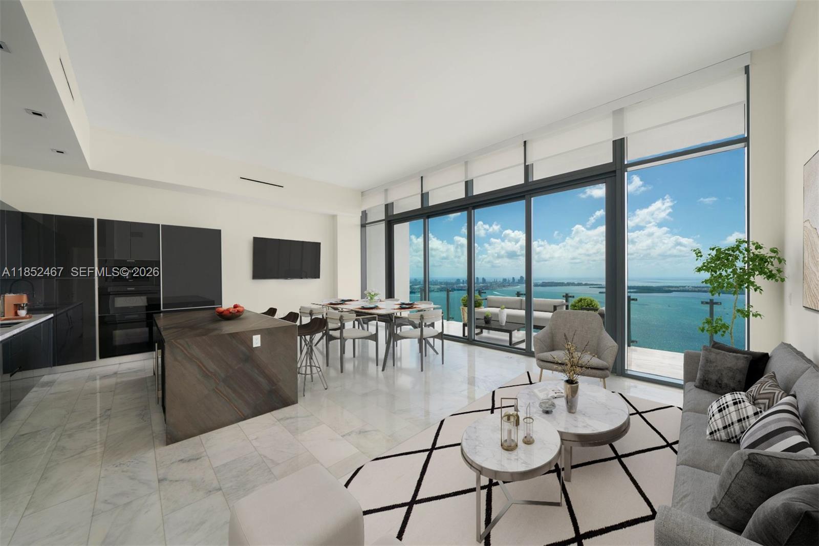 A modern open-concept living and dining area features a kitchen island and floor-to-ceiling windows — 1451 Brickell Ave # 5302, Miami FL 33131, MIAMI, FL