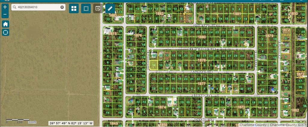 This is a digital map showing residential land parcels in a Florida neighborhood — 12068 ALUMNA AVENUE, PORT CHARLOTTE, FL