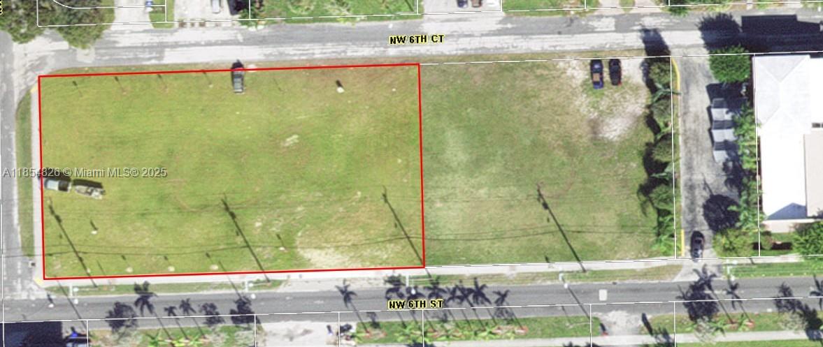 This aerial view shows a vacant rectangular lot outlined in red between two streets — 6 Nw Ct, Pompano Beach FL 33060, POMPANO BEACH, FL