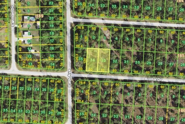 This is a map showing two highlighted adjacent rectangular land parcels in a residential subdivision — 27294 ALOHA DRIVE, PUNTA GORDA, FL