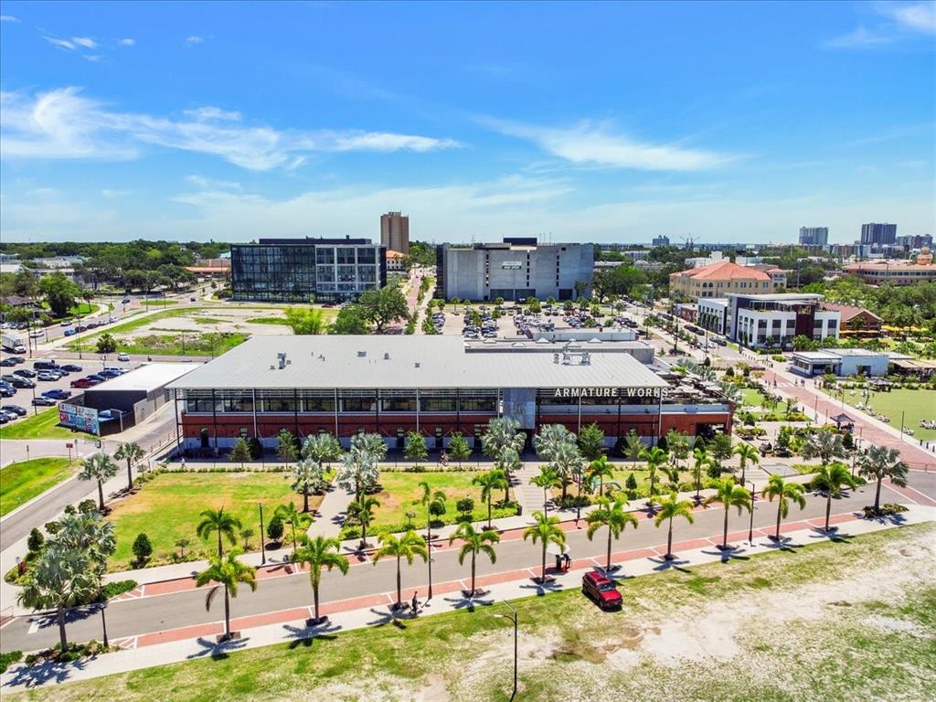 An aerial view of the Armature Works building surrounded by palm trees and city streets — 1823 E 5TH AVENUE, TAMPA, FL