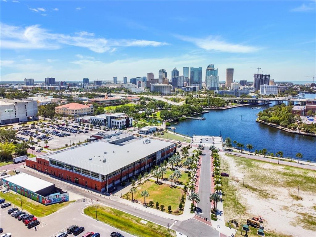 An aerial view shows Armature Works, a riverfront building, and the Tampa skyline — 1823 E 5TH AVENUE, TAMPA, FL