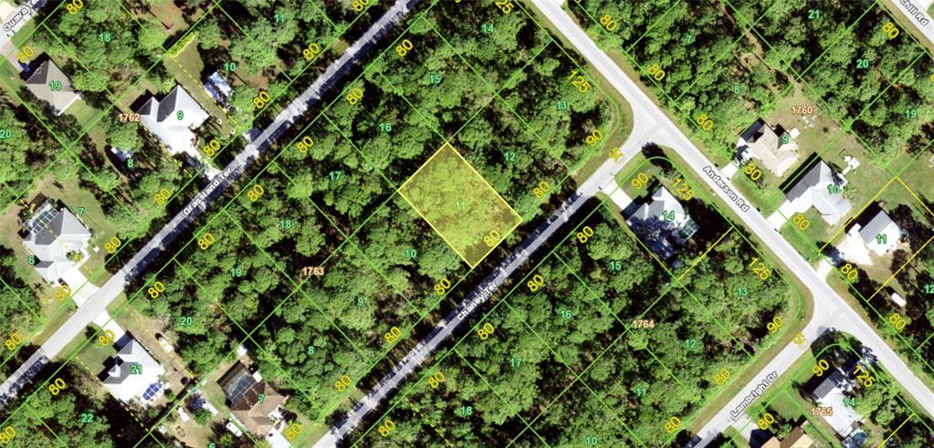 This is an aerial map showing a vacant lot highlighted in yellow among residential properties — 5237 CHANEY TERRACE, PORT CHARLOTTE, FL