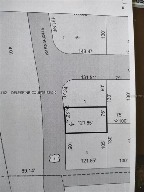 This is a land survey map showing the lot dimensions and boundaries for a property — 3837 S HOPKINS AVENUE, TITUSVILLE, FL