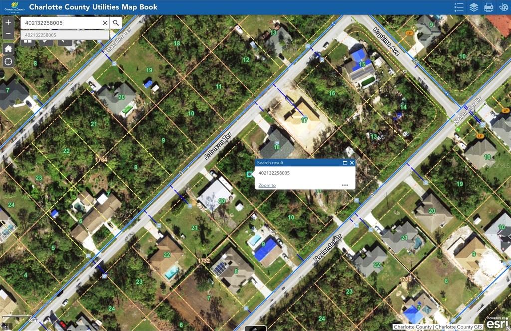 This is a digital map showing property parcel boundaries and street layouts in Charlotte County — 5258 JOHNSON TERRACE, PORT CHARLOTTE, FL