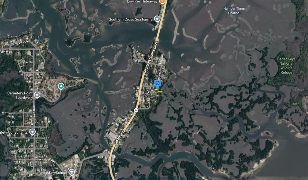 This is a satellite map view showing the coastal landscape and road layout of Cedar Key — 12425 CEDAR ST, CEDAR KEY, FL