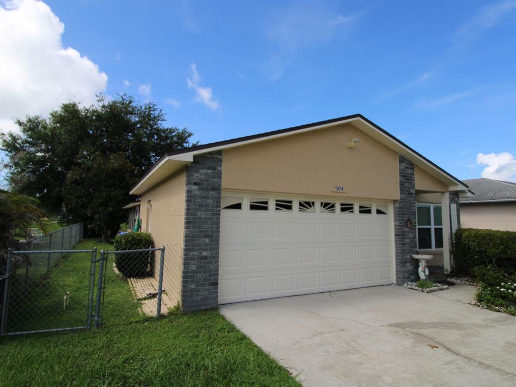 1374 BOULDER DRIVE, KISSIMMEE, FL — photo 2 of 30