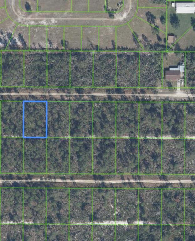 An aerial map view shows a rectangular plot of land highlighted in blue among wooded lots — 455 NIGHTINGALE AVENUE, SEBRING, FL