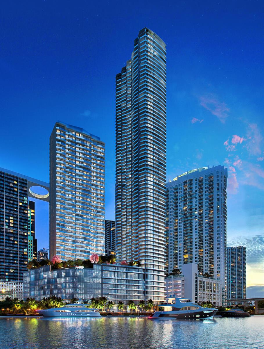 An aerial view of a tall residential skyscraper situated near a waterfront and park — 77 SE 5th Street # 2714, Miami FL 33131, MIAMI, FL