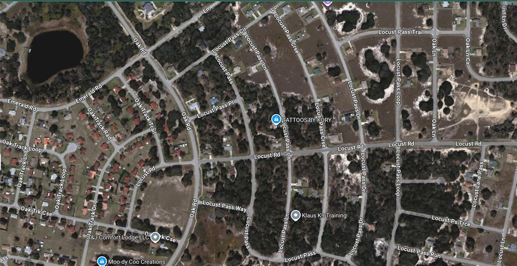 This is a satellite map view of a residential neighborhood with various labeled streets — Lot 1 LOCUST PASS COURSE, OCALA, FL