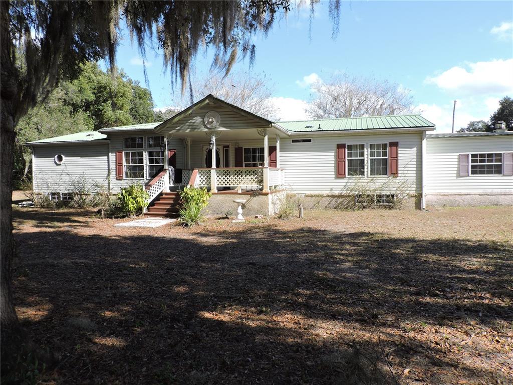 148 DENVER ROAD, CRESCENT CITY, FL — photo 2 of 30