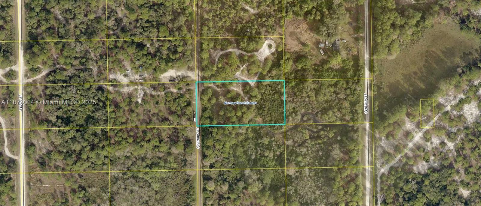 This is an aerial map showing a rectangular plot of land outlined in blue — 635 S Estribo St, Clewiston FL 33440, CLEWISTON, FL