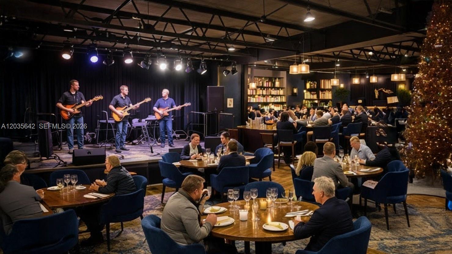 A restaurant dining room features a live band on stage and a large Christmas tree — First Generation Restaurant For Lease In Doral, Doral FL 33166, DORAL, FL