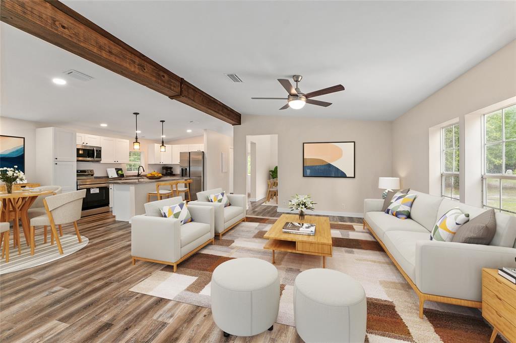 This is a digital rendering of an open-concept living room and kitchen with wood-look flooring — 6028 SW 91ST PLACE, LAKE BUTLER, FL