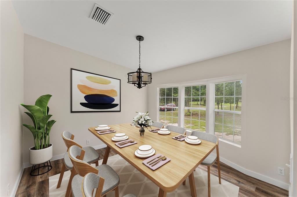 This is a digital rendering of a dining room with a wooden table and chairs — 6028 SW 91ST PLACE, LAKE BUTLER, FL