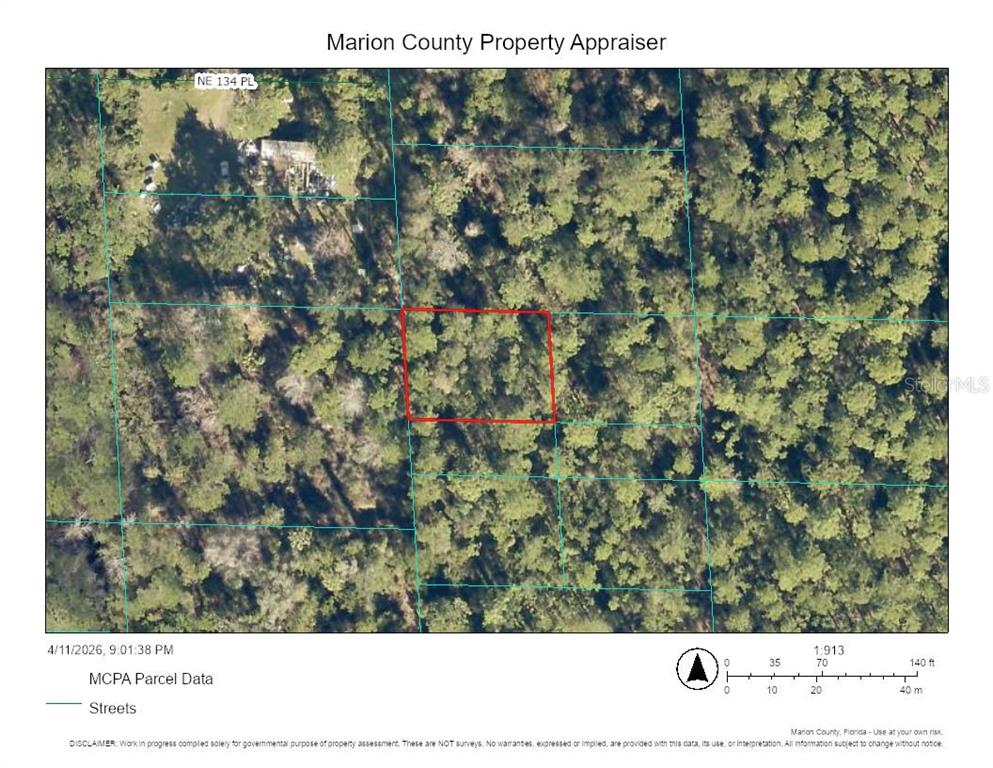 This is a map showing a parcel of land outlined in red within a wooded area — 00 NE 69TH AVENUE, CITRA, FL