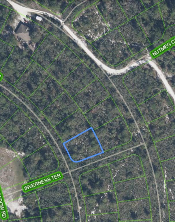 This is an aerial map showing a highlighted vacant lot located at a street intersection — 10581 INTERLACHER DRIVE, SEBRING, FL