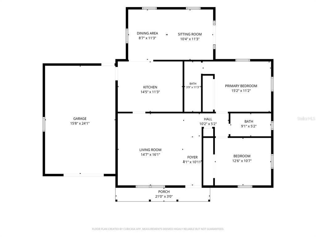 This is a floor plan of a single-story house with a garage and two bedrooms — 4263 WELDON AVENUE, SPRING HILL, FL