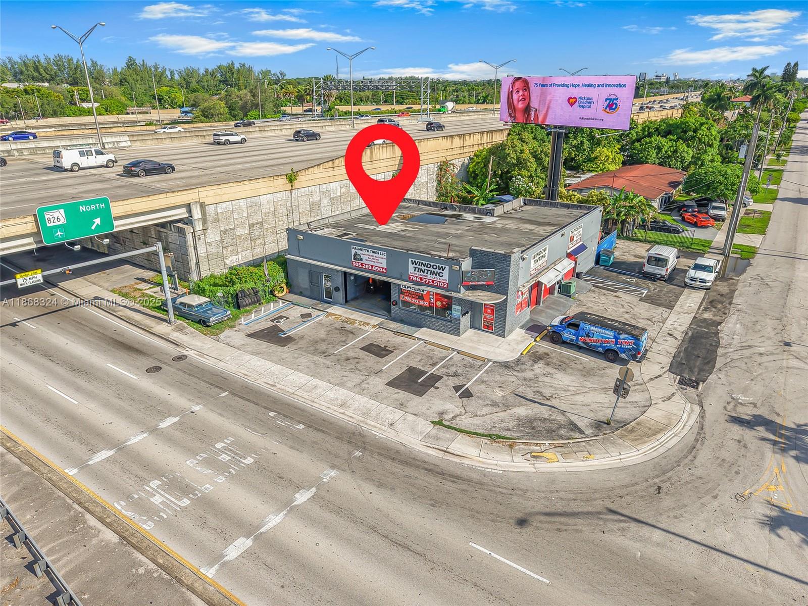 An aerial view shows a commercial building with a red location pin near a highway — 7790 SW 26th St, Miami FL 33155, MIAMI, FL