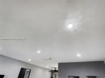 A white ceiling with recessed lighting and a ceiling fan in a modern room — 6960 NW 11th Ct, Margate FL 33063, MARGATE, FL