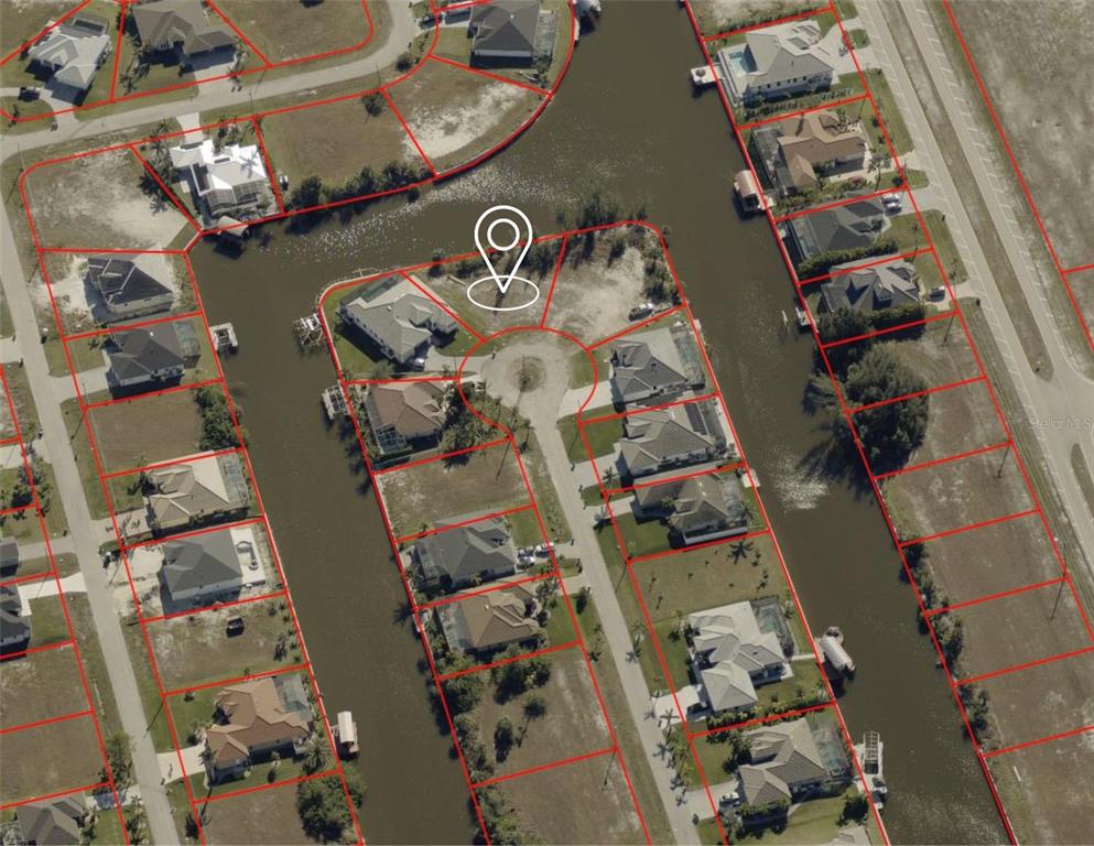 An aerial map view shows residential waterfront lots and houses surrounding a cul-de-sac — 2316 NW 39TH AVENUE, CAPE CORAL, FL
