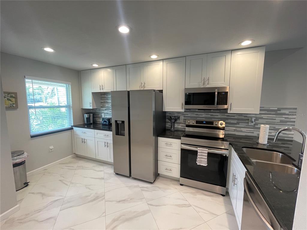 1821 ORANGE BOULEVARD WAY, PALM HARBOR, FL — photo 5 of 30