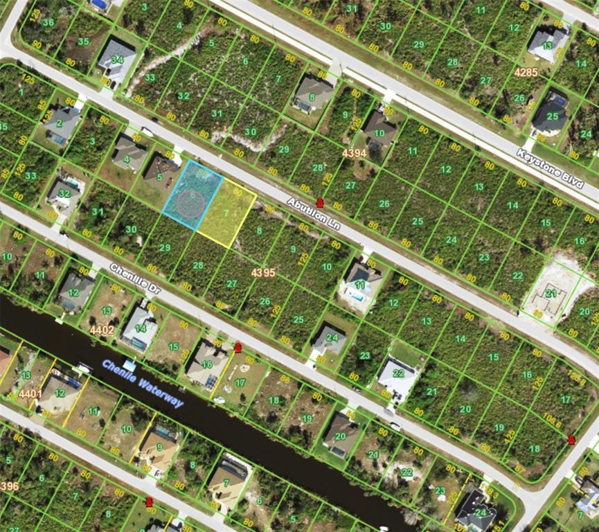 This is a satellite map showing residential land parcels and street layouts — 13493 ABUTILON LANE, PORT CHARLOTTE, FL